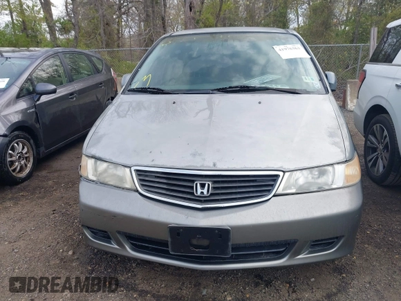2000 Honda Odyssey EX with VIN 2HKRL1864YH596967, listed as a IAAI auction lot 41976363 with 146,411 mi miles and . Bid and sale history available at DreamBid. Image 12.
