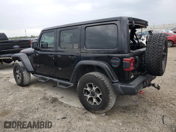 2019 Jeep Wrangler Unlimited Rubicon with VIN 1C4HJXFN6KW665805, listed as a Copart auction lot 45424005 with 141,007 mi miles and Salvage title. Bid and sale history available at DreamBid. Image 2.