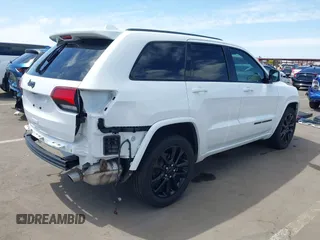 2021 Jeep Grand Cherokee Laredo E with VIN 1C4RJEAG2MC785168, listed as a IAAI auction lot 42115460 with 64,036 mi miles and . Bid and sale history available at DreamBid. Image 4.