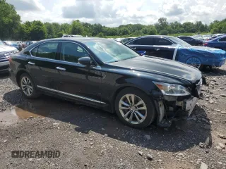 2015 Lexus LS 460 with VIN JTHCL5EF0F5025490, listed as a Copart auction lot 64000615 with 203,507 mi miles and Salvage title. Bid and sale history available at DreamBid. Image 4.