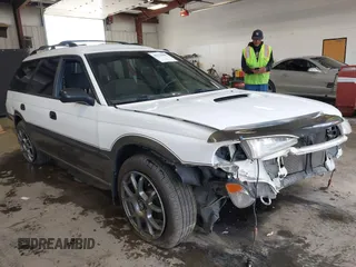 1999 Subaru Legacy Outback z VIN 4S3BG6850X7659883, wystawiony jako IAAI lot #42233605 z przebiegiem 147 606 mil mil oraz . Historia ofert i sprzedaży dostępna na DreamBid. Obrazek 1.