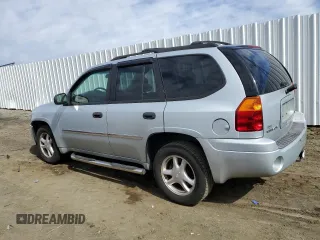2007 GMC Envoy SLT with VIN 1GKDT13SX72288947, listed as a Copart auction lot 46614935 with 220,835 mi miles and Salvage Title. Bid and sale history available at carsss.com. Image 2.
