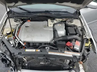 2010 Ford Fusion Hybrid z VIN 3FADP0L30AR122805, wystawiony jako Copart lot #52276255 z przebiegiem 146 073 mil mil oraz Szkoda całkowita • Salvage title. Historia ofert i sprzedaży dostępna na DreamBid. Obrazek 13.