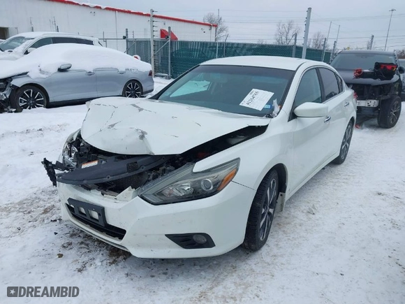 2016 Nissan Altima 2.5 SR with VIN 1N4AL3AP1GN383538, listed as a IAAI auction lot 41264765 with 129,836 mi miles. Bid and sale history available at carsss.com. Image 2.