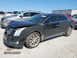 2014 Cadillac XTS Luxury z VIN 2G61M5S39E9302853, wystawiony jako Copart lot #57712215 z przebiegiem 180 886 mil mil oraz Czysty tytuł • Clean title. Historia ofert i sprzedaży dostępna na DreamBid. Obrazek 1.