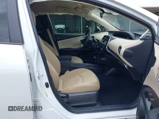 2022 Toyota Prius L Eco with VIN JTDKAMFUXN3157225, listed as a IAAI auction lot 39292379 with 59,333 mi miles and . Bid and sale history available at DreamBid. Image 5.