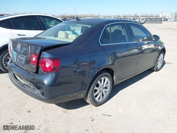 2010 Volkswagen Jetta Sedan Limited with VIN 3VWRX7AJ4AM013803, listed as a IAAI auction lot 41486509 with 162,391 mi miles. Bid and sale history available at carsss.com. Image 4.