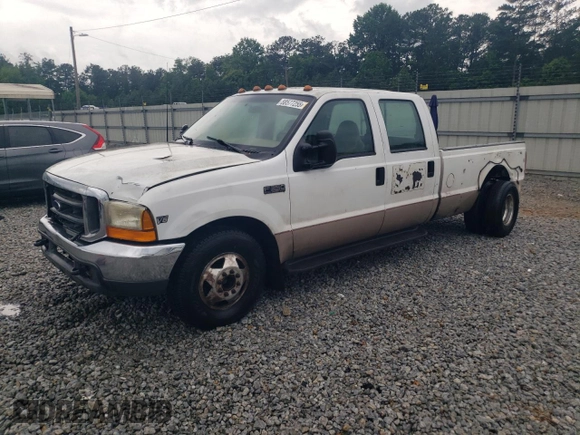 1999 Ford F-350 XL z VIN 1FTWW32F3XEA00728, wystawiony jako Copart lot #58577255 z przebiegiem 461 795 mil mil oraz Szkoda całkowita • Salvage title. Historia ofert i sprzedaży dostępna na DreamBid. Obrazek 1.