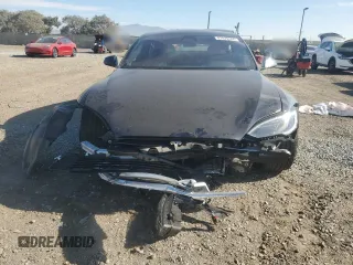 2024 Tesla Model S z VIN 5YJSA1E57RF545269, wystawiony jako Copart lot #87419784 z przebiegiem Nie podano mil oraz Szkoda całkowita • Salvage title. Historia ofert i sprzedaży dostępna na DreamBid. Obrazek 5.