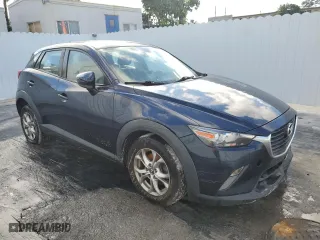 2016 Mazda CX-3 Touring with VIN JM1DKFC70G0140065, listed as a Copart auction lot 43046265 with 99,096 mi miles and Clean Title. Bid and sale history available at carsss.com. Image 4.