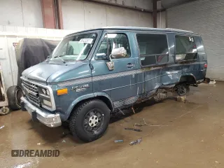 1995 Chevrolet Chevy Van z VIN 1GBEG25K2SF243949, wystawiony jako Copart lot #50422305 z przebiegiem 193 169 mil mil oraz Szkody całkowita. Historia ofert i sprzedaży dostępna na DreamBid. Obrazek 1.