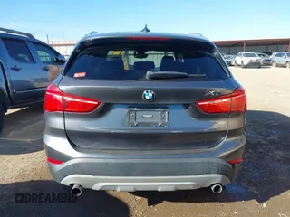 2017 BMW X1 sDrive28i with VIN WBXHU7C30H5H32753, listed as a IAAI auction lot 41441791 with 100,072 mi miles. Bid and sale history available at carsss.com. Image 17.