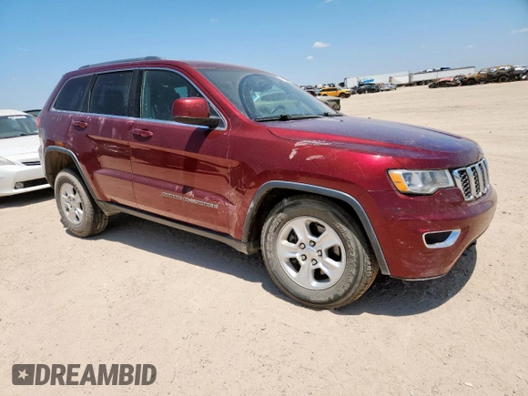2017 Jeep Grand Cherokee Laredo with VIN 1C4RJFAG7HC693789, listed as a Copart auction lot 61827925 with 143,019 mi miles and Salvage title. Bid and sale history available at DreamBid. Image 4.