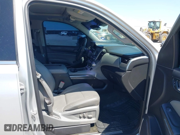 2015 Chevrolet Tahoe LT with VIN 1GNSCBKC6FR303850, listed as a IAAI auction lot 42254115 with 147,856 mi miles and . Bid and sale history available at DreamBid. Image 5.