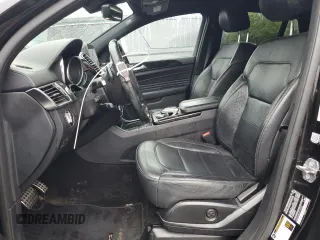 2019 Mercedes-Benz GLE 43 AMG with VIN 4JGED6EB5KA137564, listed as a Copart auction lot 57213595 with 104,144 mi miles and Salvage title. Bid and sale history available at DreamBid. Image 7.