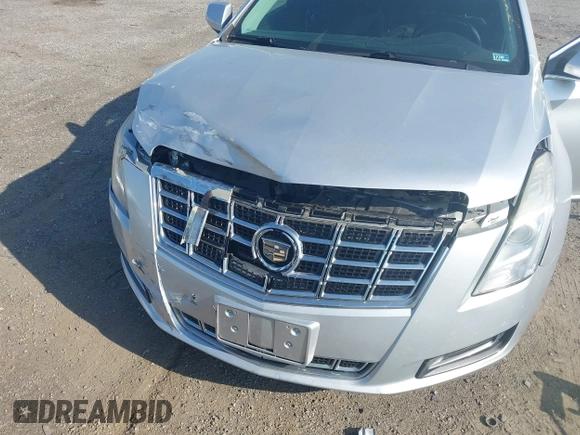 2013 Cadillac XTS with VIN 2G61N5S31D9135710, listed as a IAAI auction lot 42002480 with 162,029 mi miles. Bid and sale history available at carsss.com. Image 6.