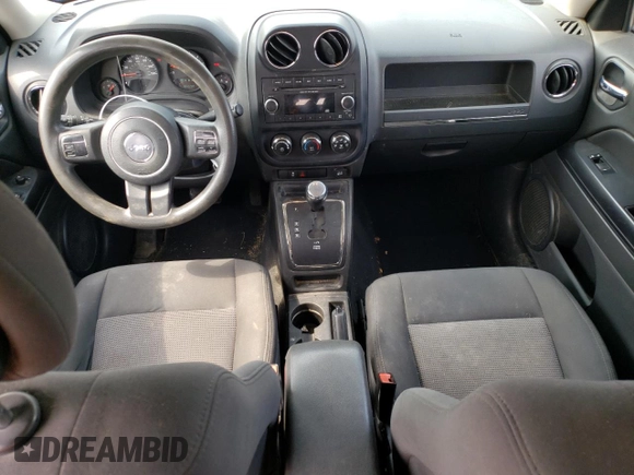 2012 Jeep Patriot Sport with VIN 1C4NJRBB9CD614936, listed as a Copart auction lot 56124675 with 194,590 mi miles and Salvage title. Bid and sale history available at DreamBid. Image 8.