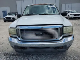 2003 Ford F-250 XL with VIN 1FTNX20L63EB37975, listed as a Copart auction lot 65723935 with 157,377 mi miles and Salvage title. Bid and sale history available at DreamBid. Image 5.