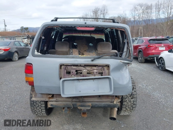 1995 Jeep Grand Cherokee Laredo with VIN 1J4GZ58S4SC778322, listed as a IAAI auction lot 41498800 with 255,058 mi miles. Bid and sale history available at carsss.com. Image 17.