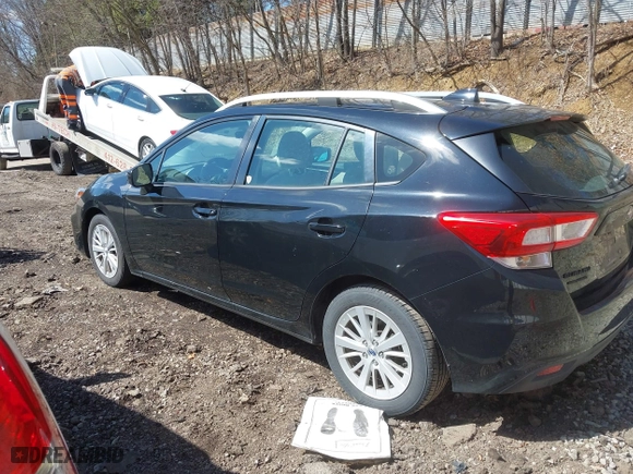 2017 Subaru Impreza Premium with VIN 4S3GTAD65H3716428, listed as a IAAI auction lot 41942299 with 77,181 mi miles. Bid and sale history available at carsss.com. Image 15.