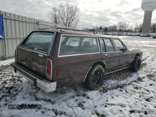 1989 Ford Crown Victoria z VIN 2FABP77F8KX129671, wystawiony jako Copart lot #86410274 z przebiegiem 58 851 mil mil oraz Szkody całkowita. Historia ofert i sprzedaży dostępna na DreamBid. Obrazek 3.