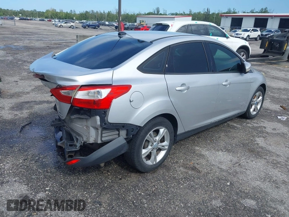 2013 Ford Focus SE with VIN 1FADP3F28DL217636, listed as a IAAI auction lot 42465123 with 187,088 mi miles and . Bid and sale history available at DreamBid. Image 4.