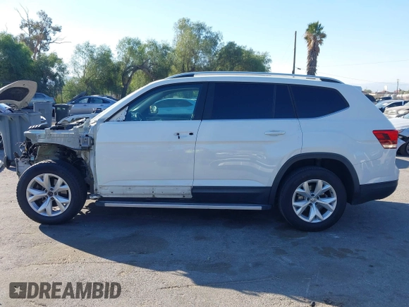 2018 Volkswagen Atlas SE с VIN 1V2DR2CA9JC551484, выставлен на аукционе IAAI как лот 41262713 с пробегом 59 054 миль миль и . История ставок и продаж доступна на DreamBid. Изображение 15.