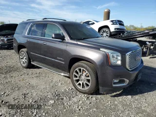 2015 GMC Yukon Denali with VIN 1GKS2CKJ9FR727818, listed as a Copart auction lot 50410655 with 0 mi miles and Salvage Title. Bid and sale history available at carsss.com. Image 4.