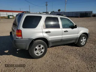 2003 Ford Escape XLT Popular 2 with VIN 1FMYU93123KD17718, listed as a Copart auction lot 74043074 with 347,585 mi miles and Clean Title. Bid and sale history available at carsss.com. Image 3.