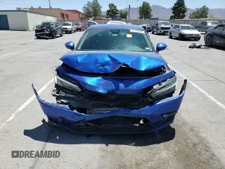 2023 Honda Civic EX с VIN 2HGFE1F7XPH310539, выставлен на аукционе Copart как лот 57753885 с пробегом 26 878 миль миль и Списание • Salvage title. История ставок и продаж доступна на DreamBid. Изображение 13.
