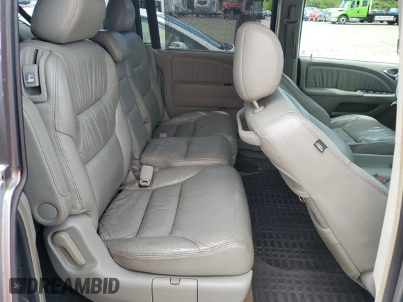 2006 Honda Odyssey EX-L z VIN 5FNRL38796B104224, wystawiony jako Copart lot #59049985 z przebiegiem 161 476 mil mil oraz Czysty tytuł • Clean title. Historia ofert i sprzedaży dostępna na DreamBid. Obrazek 11.