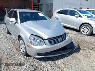 2008 Kia Optima LX z VIN KNAGE123385225909, wystawiony jako IAAI lot #42184219 z przebiegiem 118 300 mil mil oraz . Historia ofert i sprzedaży dostępna na DreamBid. Obrazek 1.