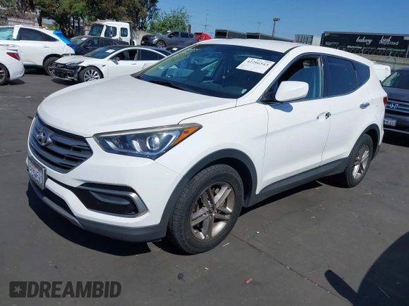 2017 Hyundai Santa Fe 2.4L z VIN 5XYZTDLB0HG403842, wystawiony jako IAAI lot #42206543 z przebiegiem 77 900 mil mil oraz . Historia ofert i sprzedaży dostępna na DreamBid. Obrazek 2.