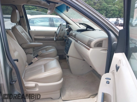 2005 Ford Freestar SEL z VIN 2FMDA52255BA39548, wystawiony jako IAAI lot #42467902 z przebiegiem 86 589 mil mil oraz . Historia ofert i sprzedaży dostępna na DreamBid. Obrazek 5.
