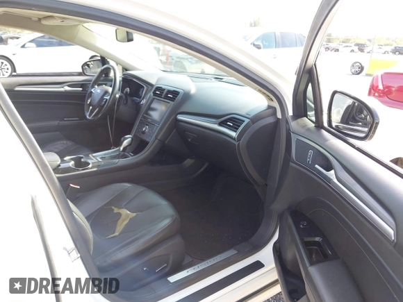 2014 Ford Fusion Titanium with VIN 3FA6P0K90ER172690, listed as a IAAI auction lot 42697162 with Not provided miles and . Bid and sale history available at DreamBid. Image 5.