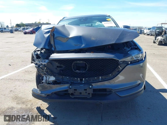 2019 Mazda CX-5 Touring with VIN JM3KFACM1K0533142, listed as a IAAI auction lot 41880181 with Not Provided miles and . Bid and sale history available at carsss.com. Image 12.