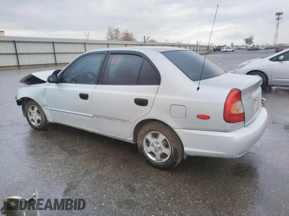 2002 Hyundai Accent GL with VIN KMHCG45C02U301443, listed as a Copart auction lot 80670164 with 124,163 mi miles and Salvage Title. Bid and sale history available at carsss.com. Image 2.