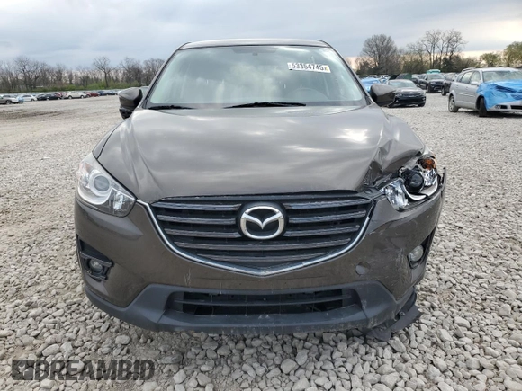 2016 Mazda CX-5 Touring with VIN JM3KE2CY8G0902131, listed as a Copart auction lot 53354745 with 123,474 mi miles and Salvage Title. Bid and sale history available at carsss.com. Image 5.