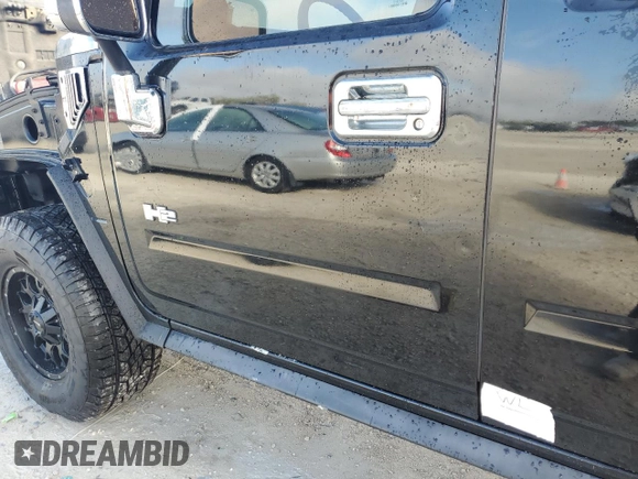 2003 Hummer H2 with VIN 5GRGN23U33H148965, listed as a Copart auction lot 78187534 with 23,202 mi miles and Non Repairable. Bid and sale history available at carsss.com. Image 13.