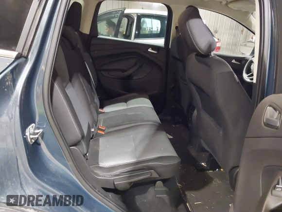 2019 Ford Escape SE z VIN 1FMCU9GDXKUA54699, wystawiony jako IAAI lot #41667188 z przebiegiem 127 376 mil mil oraz . Historia ofert i sprzedaży dostępna na DreamBid. Obrazek 8.