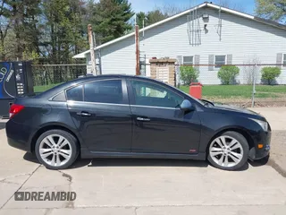 2011 Chevrolet Cruze LTZ with VIN 1G1PH5S93B7233129, listed as a IAAI auction lot 42061950 with 204,583 mi miles and . Bid and sale history available at DreamBid. Image 14.