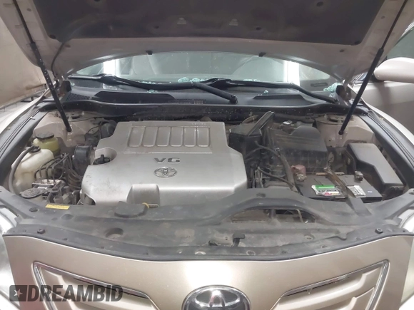2007 Toyota Camry LE z VIN 4T1BK46K27U006559, wystawiony jako IAAI lot #42250629 z przebiegiem 175 389 mil mil oraz . Historia ofert i sprzedaży dostępna na DreamBid. Obrazek 10.