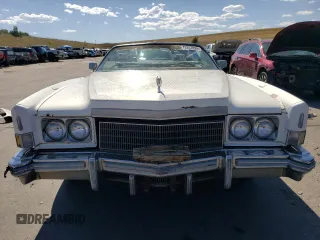1976 Cadillac Eldorado z VIN 6L67S4Q405945, wystawiony jako Copart lot #73257834 z przebiegiem 98 761 mil mil oraz Nie do naprawy • Non repairable. Historia ofert i sprzedaży dostępna na DreamBid. Obrazek 5.