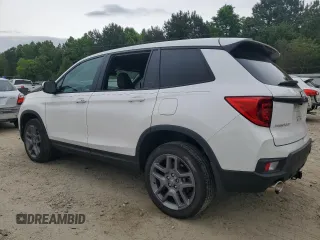 2023 Honda Passport EX-L z VIN 5FNYF8H51PB033343, wystawiony jako Copart lot #56594665 z przebiegiem 18 554 mil mil oraz Szkoda całkowita • Salvage title. Historia ofert i sprzedaży dostępna na DreamBid. Obrazek 2.