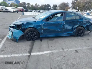 2025 Toyota Camry LE z VIN 4T1DAACK3SU571104, wystawiony jako IAAI lot #42084430 z przebiegiem 1 013 mil mil oraz . Historia ofert i sprzedaży dostępna na DreamBid. Obrazek 14.