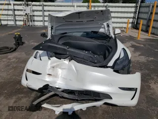 2023 Tesla Model 3 z VIN 5YJ3E1EA7PF576489, wystawiony jako Copart lot #61039505 z przebiegiem 35 243 mil mil oraz Nie do naprawy • Non repairable. Historia ofert i sprzedaży dostępna na DreamBid. Obrazek 5.
