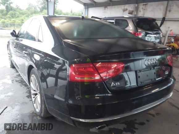 2012 Audi A8 with VIN WAUAVAFD9CN006499, listed as a IAAI auction lot 42461402 with 57,232 mi miles and . Bid and sale history available at DreamBid. Image 3.