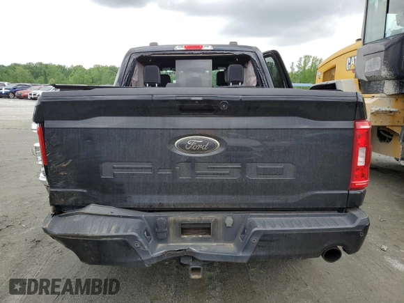 2023 Ford F-150 XL z VIN 1FTFW1E52PFC97105, wystawiony jako Copart lot #62115825 z przebiegiem 27 400 mil mil oraz Szkoda całkowita • Salvage title. Historia ofert i sprzedaży dostępna na DreamBid. Obrazek 6.