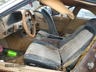1979 Datsun 280ZX z VIN HGS130115983, wystawiony jako Copart lot #54709755 z przebiegiem 74 026 mil mil oraz Tytuł czysty. Historia ofert i sprzedaży dostępna na DreamBid. Obrazek 7.