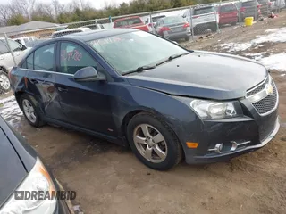 2014 Chevrolet Cruze 1LT with VIN 1G1PC5SB5E7229007, listed as a IAAI auction lot 41544780 with 98,075 mi miles and . Bid and sale history available at DreamBid. Image 13.
